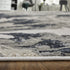 9' X 12' Ivory Black and Taupe Abstract Power Loom Area Rug