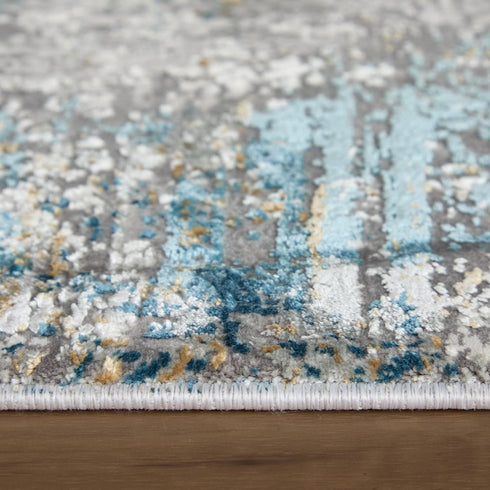 8' X 11' Ivory Gray and Blue Abstract Power Loom Area Rug With Fringe