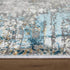 8' X 11' Ivory Gray and Blue Abstract Power Loom Area Rug With Fringe
