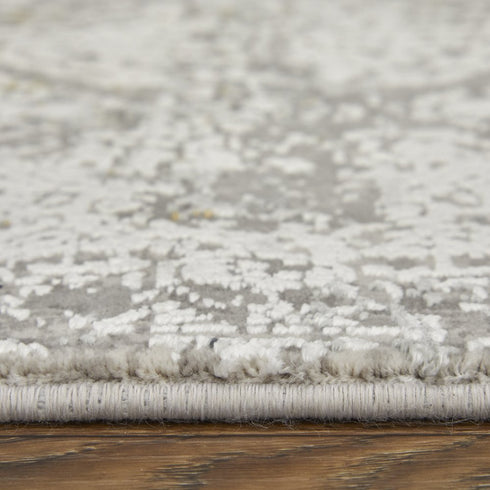 8' X 11' Ivory Taupe and Gray Abstract Power Loom Distressed Area Rug With Fringe
