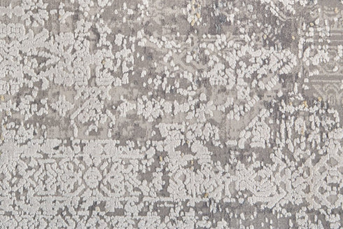 8' X 11' Ivory Taupe and Gray Abstract Power Loom Distressed Area Rug With Fringe