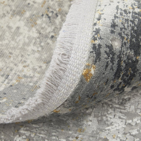8' X 11' Ivory Taupe and Gray Abstract Power Loom Distressed Area Rug With Fringe