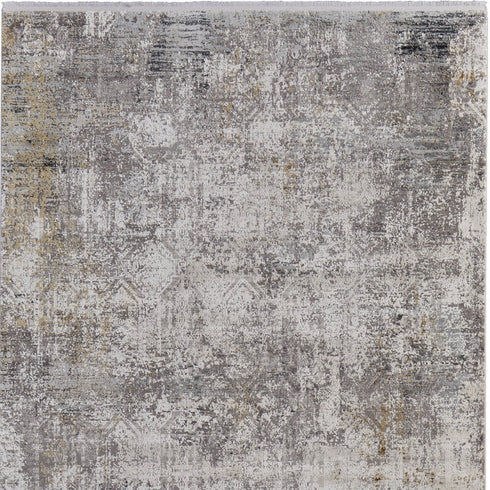 8' X 11' Ivory Taupe and Gray Abstract Power Loom Distressed Area Rug With Fringe