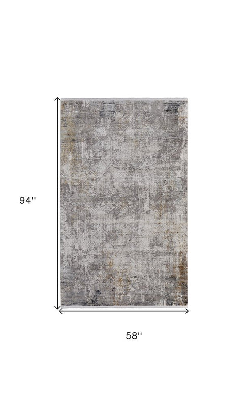 8' X 11' Ivory Taupe and Gray Abstract Power Loom Distressed Area Rug With Fringe