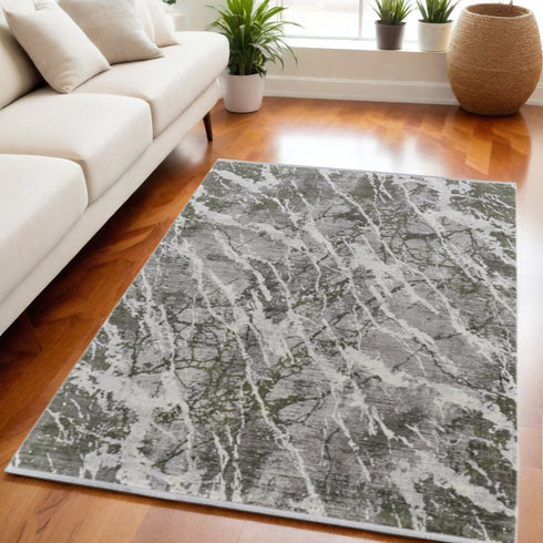 8' X 11' Taupe and Gray Abstract Power Loom Area Rug With Fringe