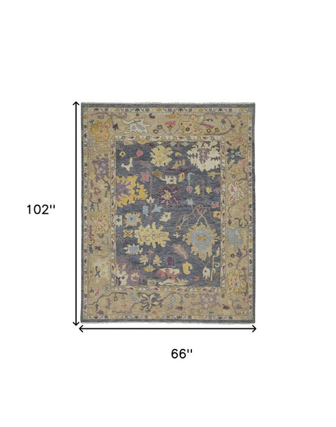 8' X 12' Gold Blue and Purple Wool Oriental Hand Knotted Area Rug With Fringe