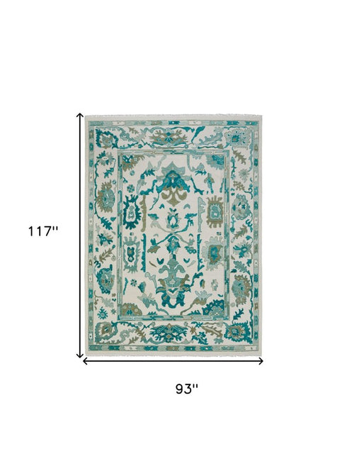 8' X 12' Green and Ivory Wool Floral Hand Knotted Area Rug With Fringe
