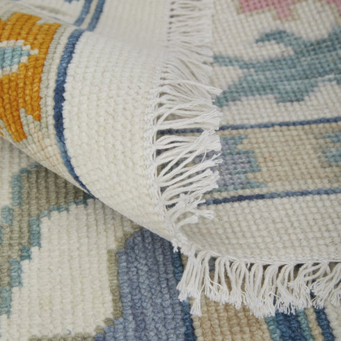 8' X 12' Blue Ivory and Pink Wool Floral Hand Knotted Area Rug With Fringe