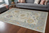 9' X 13' Gray Ivory and Orange Wool Floral Hand Knotted Area Rug With Fringe