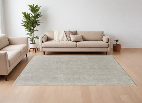 8' X 10' Tan and Ivory Wool Hand Knotted Area Rug