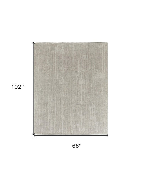 8' X 10' Tan and Ivory Wool Hand Knotted Area Rug