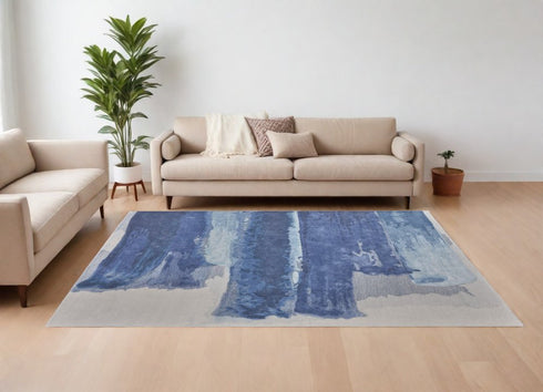 8' X 10' Blue and Ivory Abstract Hand Tufted Area Rug