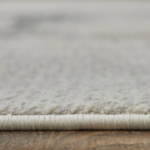 9' X 12' Ivory Blue and Brown Abstract Power Loom Area Rug