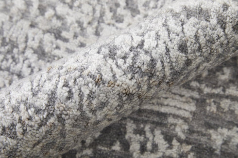 5' X 8' Gray And Silver Abstract Hand Woven Distressed Area Rug