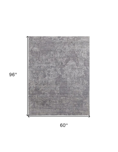 5' X 8' Gray And Silver Abstract Hand Woven Distressed Area Rug