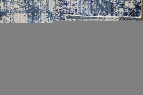8' X 10' Blue and Ivory Abstract Hand Woven Worn Faded Area Rug