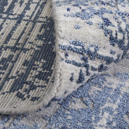 8' X 10' Blue and Ivory Abstract Hand Woven Worn Faded Area Rug
