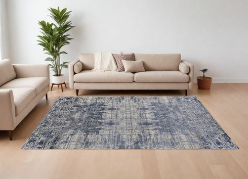 8' X 10' Blue and Ivory Abstract Hand Woven Worn Faded Area Rug