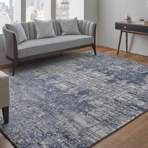 8' X 10' Blue and Ivory Abstract Hand Woven Worn Faded Area Rug