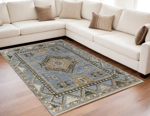 8' X 10' Ivory Tan and Blue Wool Oriental Hand Knotted Area Rug With Fringe