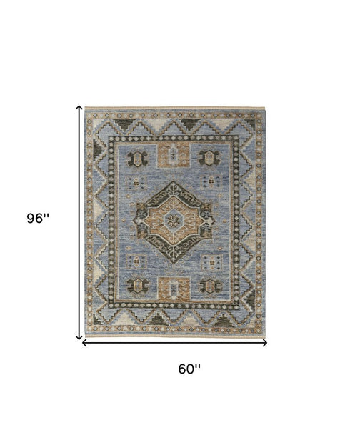 8' X 10' Ivory Tan and Blue Wool Oriental Hand Knotted Area Rug With Fringe