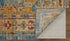 9' X 12' Blue Red and Yellow Wool Geometric Hand Knotted Area Rug With Fringe