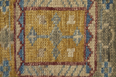 9' X 12' Blue Red and Yellow Wool Geometric Hand Knotted Area Rug With Fringe