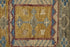 9' X 12' Blue Red and Yellow Wool Geometric Hand Knotted Area Rug With Fringe