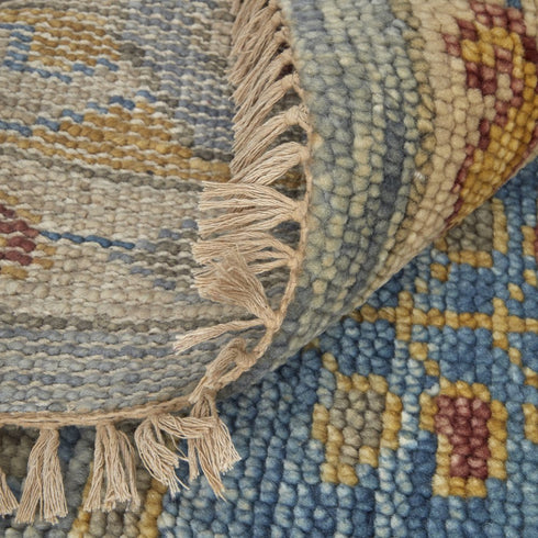 9' X 12' Blue Red and Yellow Wool Geometric Hand Knotted Area Rug With Fringe