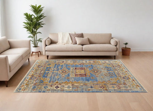 9' X 12' Blue Red and Yellow Wool Geometric Hand Knotted Area Rug With Fringe