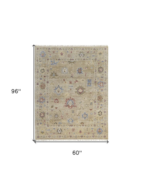 9' X 12' Tan Brown and Blue Wool Floral Hand Knotted Area Rug With Fringe