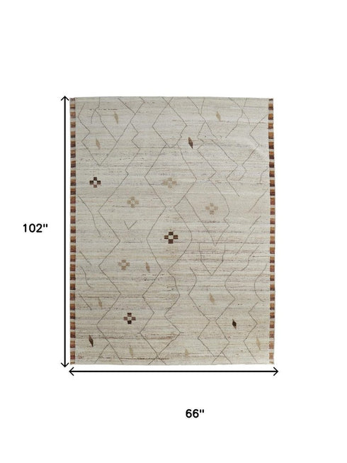 8' X 10' Ivory And Tan Wool Moroccan Hand Knotted Area Rug