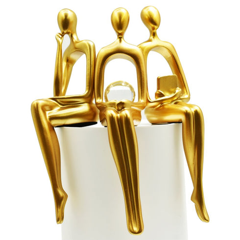 Set of Three Gold Resin People Tabletop Sculpture