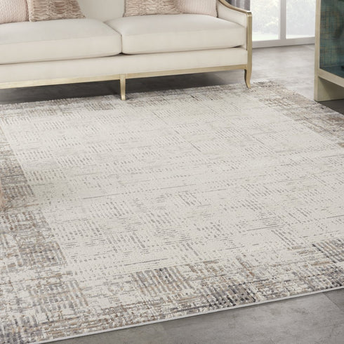 8' X 11' Ivory and Gray Abstract Area Rug