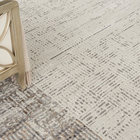 8' X 11' Ivory and Gray Abstract Area Rug