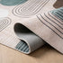 5' X 8' Beige Brown and Green Abstract Area Rug