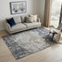 5' X 8' Beige Dark Blue And Gray Abstract Area Rug