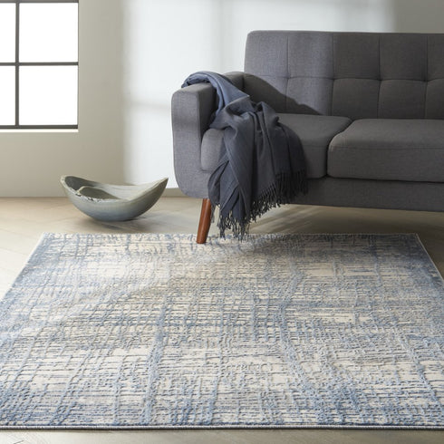 6' X 9' Ivory Abstract Area Rug