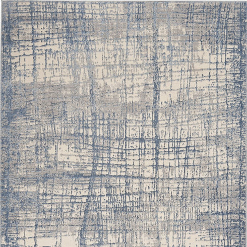 7' X 10' Ivory Abstract Power Loom Area Rug