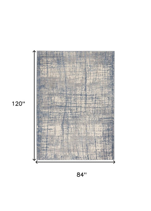 7' X 10' Ivory Abstract Power Loom Area Rug