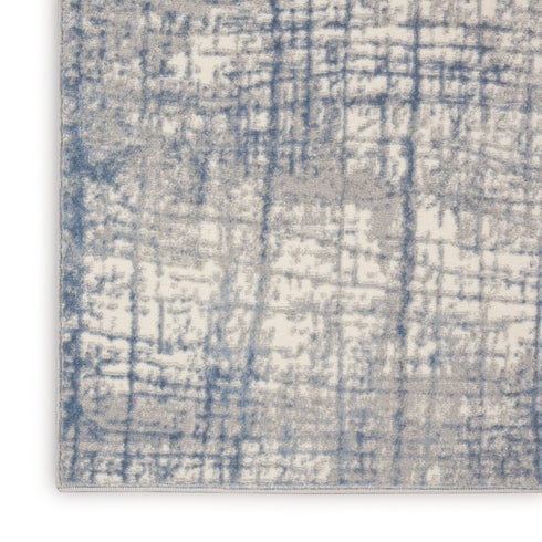 7' X 10' Ivory Abstract Power Loom Area Rug