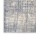 7' X 10' Ivory Abstract Power Loom Area Rug