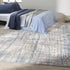 7' X 10' Ivory Abstract Power Loom Area Rug