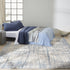 7' X 10' Ivory Abstract Power Loom Area Rug