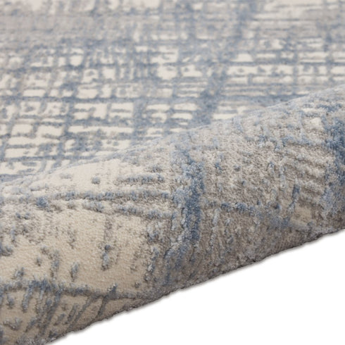 7' X 10' Ivory Abstract Power Loom Area Rug