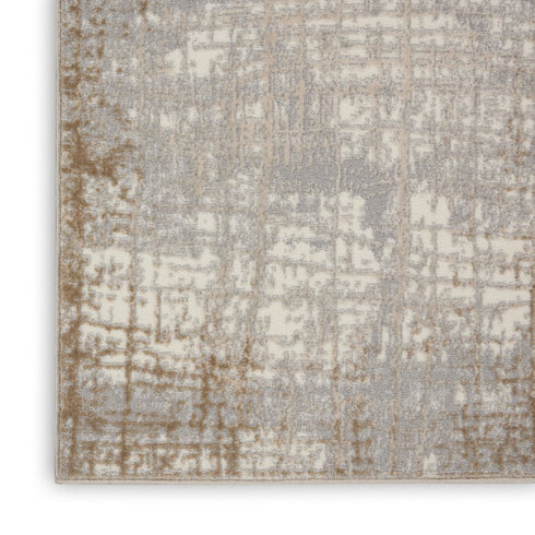 7' X 10' Ivory Abstract Power Loom Area Rug