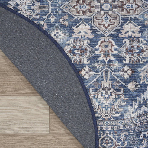 8' Blue Floral Power Loom Worn Faded Round Rug