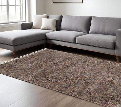 8' X 11' Orange Blue And Yellow Abstract Shag Area Rug With Fringe