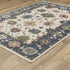 8' X 11' Blue And Ivory Floral Area Rug With Fringe