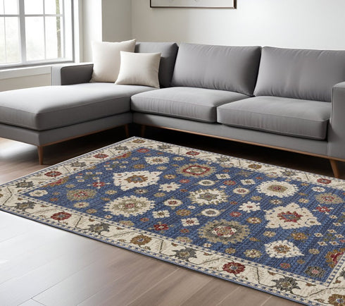 8' X 11' Blue And Ivory Floral Area Rug With Fringe